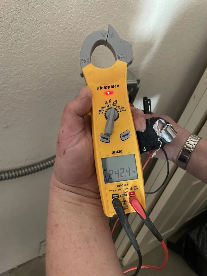 Voltage testing with clamp meter during Generator Installation in North Weeki Wachee